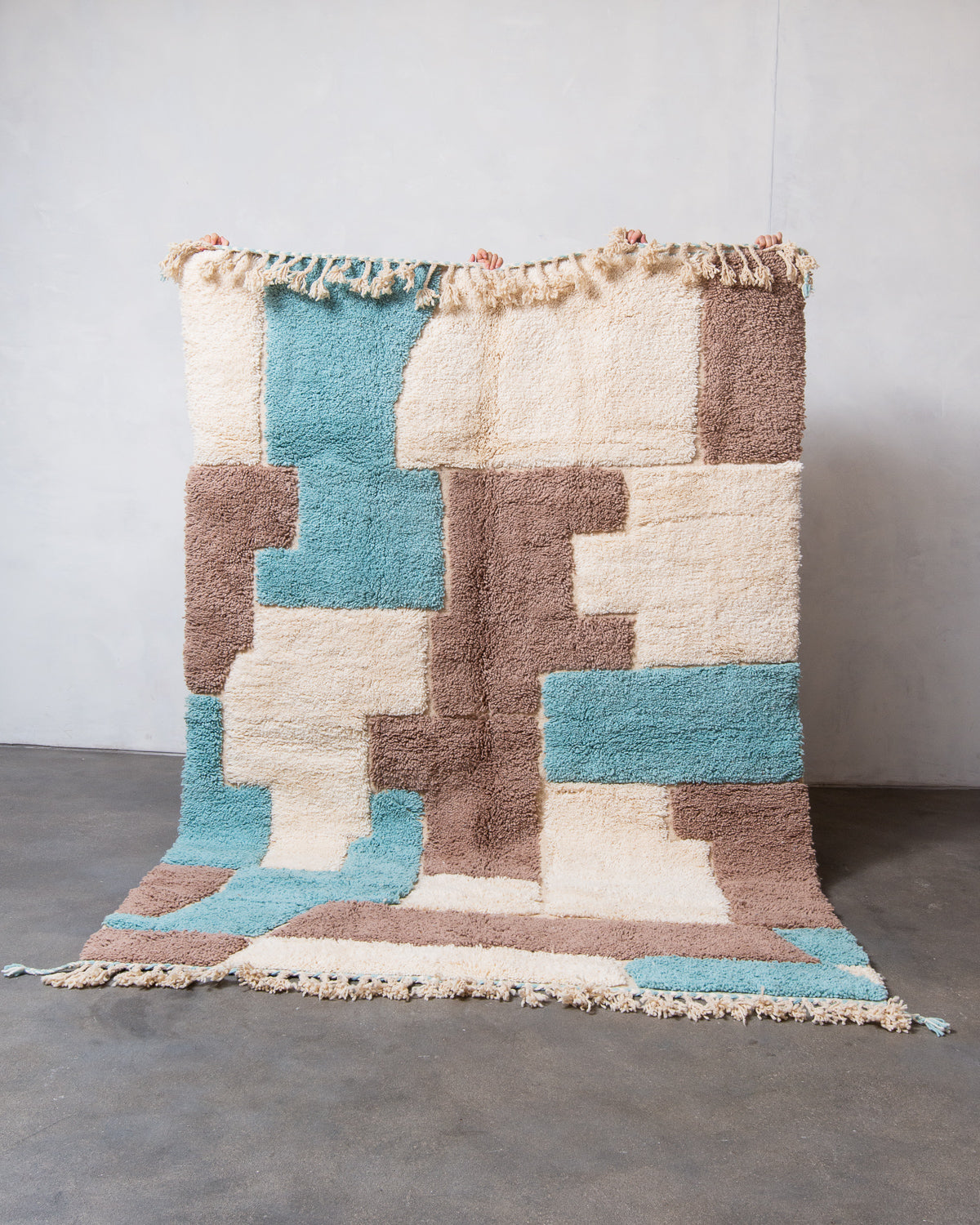 Modern, designer, handcrafted Berber rug from Morocco. Beniourain carpet with beautiful colours and patterns and fluffy wool texture.